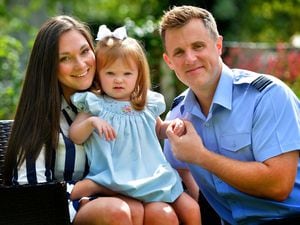 SHREW COPYRIGHT SHROPSHIRE STAR STEVE LEATH 23/08/2023..Pic at RAF Shawbury where serviceman: Nick Smith is pictured with wife: Amber Smith and daughter Charlotte Smith 2. Nick is campaigning for those with Cystic Fibrosis to get free prescriptions, inspired by his daughter who has the condition..