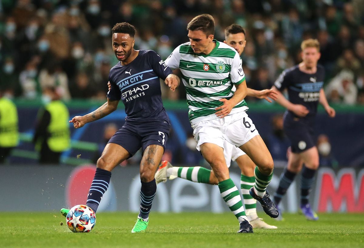 Manchester City's Raheem Sterling (left) and Sporting Lisbon's Maria Joao Palhinha battle for the ball during the UEFA Champions League Round of 16 1st Leg match at the Jose Alvalade Stadium, Lisbon. Picture date: Tuesday February 15, 2022. PA Photo. See PA story SOCCER Man City. Photo credit should read: Isabel Infantes/PA Wire...RESTRICTIONS: Use subject to restrictions. Editorial use only, no commercial use without prior consent from rights holder..