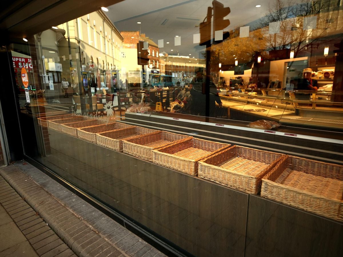 Empty baskets in a bakery (Tim Goode/PA)