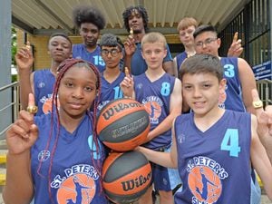 St Peter's Collegiate academy, Wolverhampton, Year 8 basketball team. Pictured front left, Ella Otisi and Alfie Marston with the team.