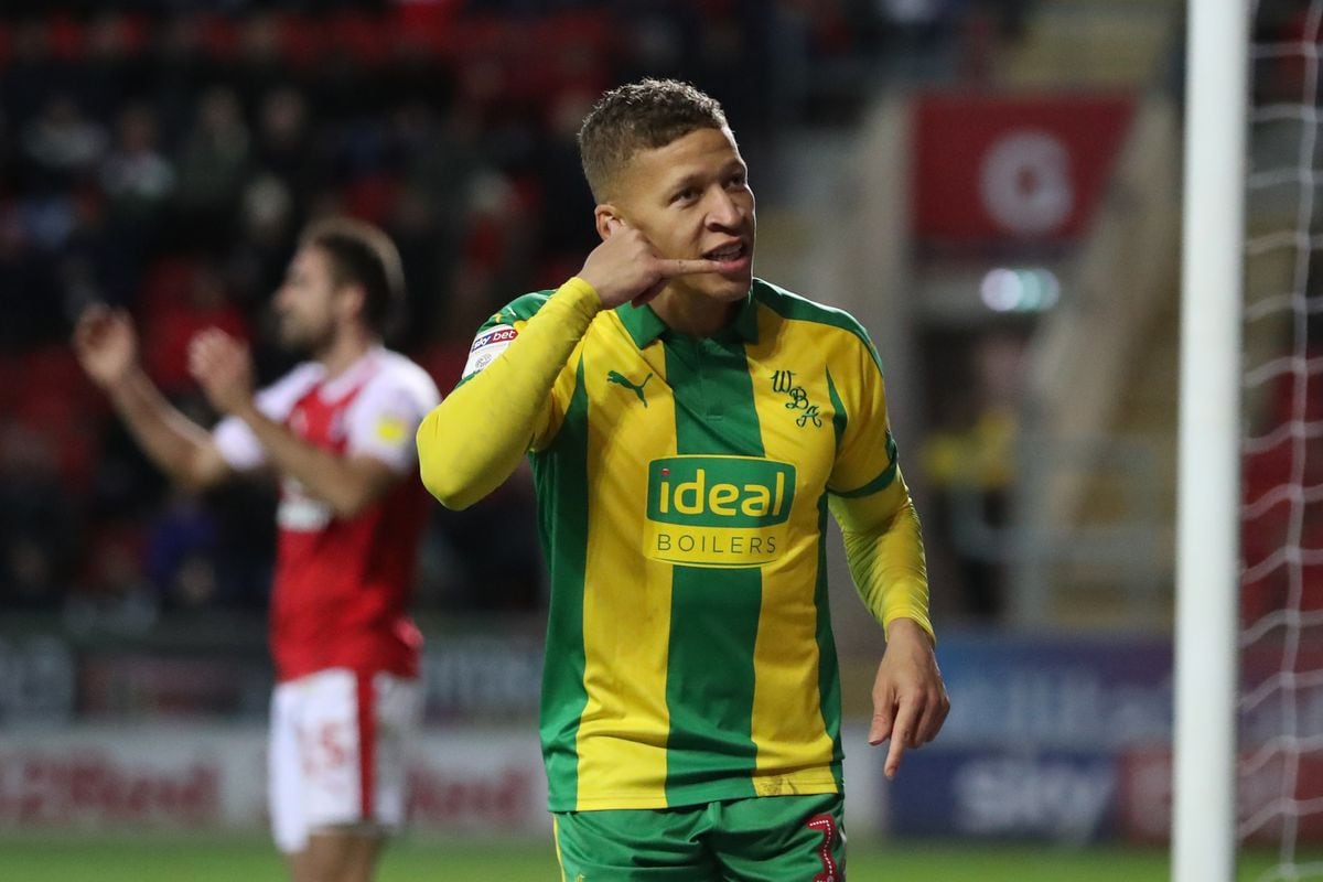 Dwight Gayle celebrates his hat-trick with his trademark celebration. (AMA)