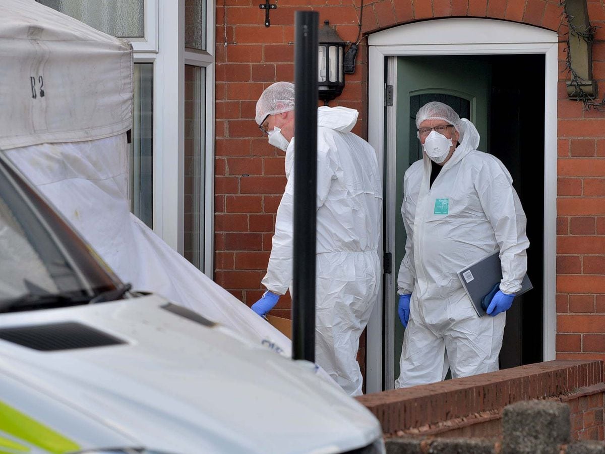 Forensic specialists at the scene in Broad Lane, Bloxwich