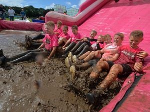 Youngsters at Race for Life Pretty Muddy 5k event at Sandwell Valley Country Park 