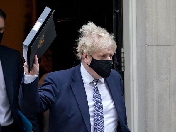 Prime Minister Boris Johnson leaves 10 Downing Street to make a statement in the House of Commons