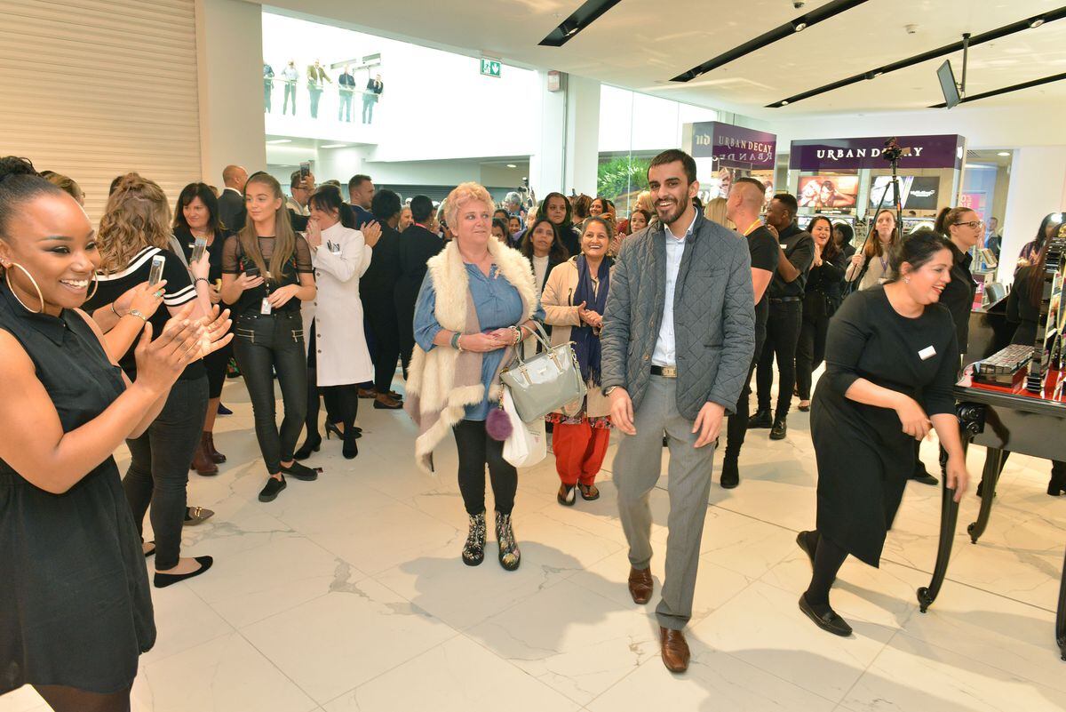 The first shoppers entering Debenhams when it opened in October 2017