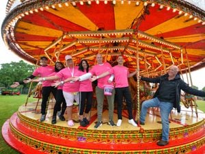 Enjoying a funfair staff members with (right) Select Lifestyles owner Nick Horton, at Dartmouth Park, West Bromwich