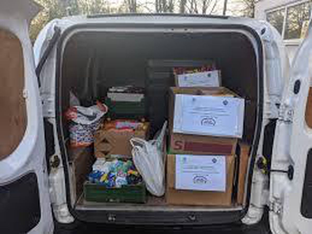A van is loaded up at the Association of Ukrainians in Great Britain club in Wolverhampton