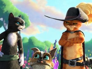 Kitty Soft Paws (voiced by Salma Hayek Pinault), Perro (Harvey Guillen) and Puss in Boots (Antonio Banderas) in Puss In Boots: The Last Wish