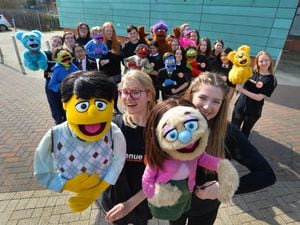 Ready to put on Avenue Q, pupils including (front left) Lauren Poole, 16, and (front right) Paige Cordingley, 17, at Highfields School, Penn..