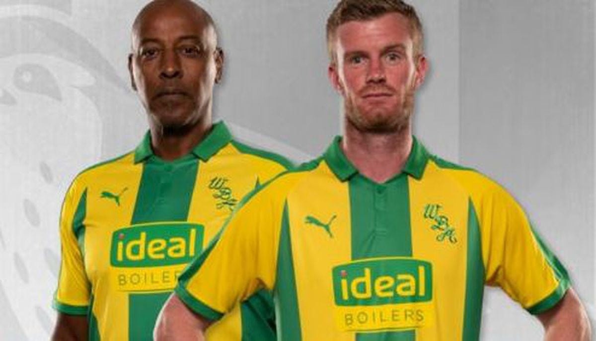 Brendon Batson and Chris Brunt model the new green and yellow kit.