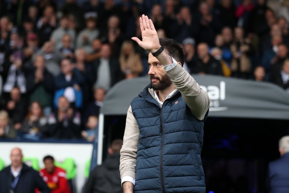 Carlos Corberan Head Coach / Manager of West Bromwich Albion waves to the West Bromwich Albion Fans as he is introduced to the Albion supporters during the Sky Bet Championship between West Bromwich Albion and Sheffield United at The Hawthorns on October 29, 2022 in West Bromwich, United Kingdom. (Photo by Adam Fradgley/West Bromwich Albion FC via Getty Images).
