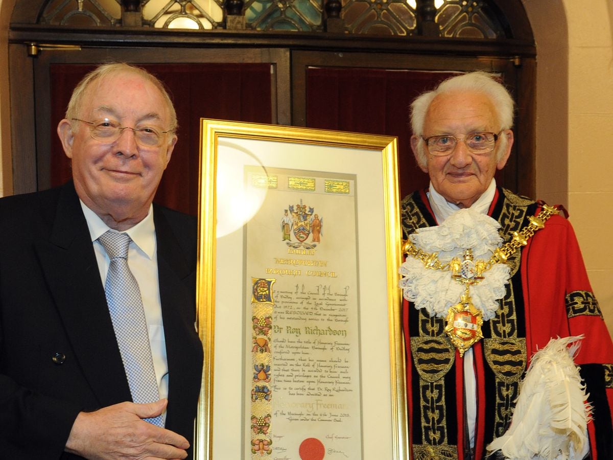 Roy Richardson with the scroll making him a Freeman of the Borough of Dudley, with mayor, Councillor Alan Taylor