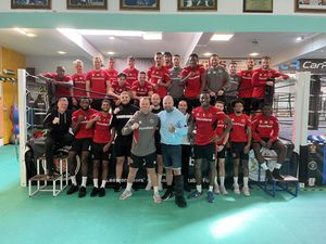 Michael Flynn and his Saddlers squad at Wolverhampton Boxing Club with head coach Richie Carter