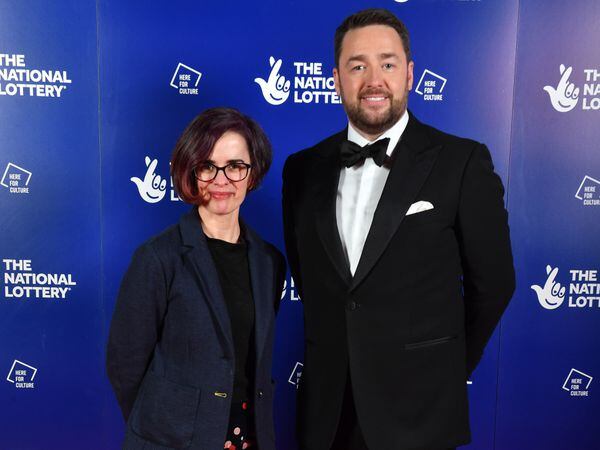 Claire Morris, co-founder of Fallen Angels dance charity, meets Jason Manford on the red carpet of the National Lottery's Big Night of Musicals. (Anthony Devlin/Getty Images for The National Lottery /PA)
