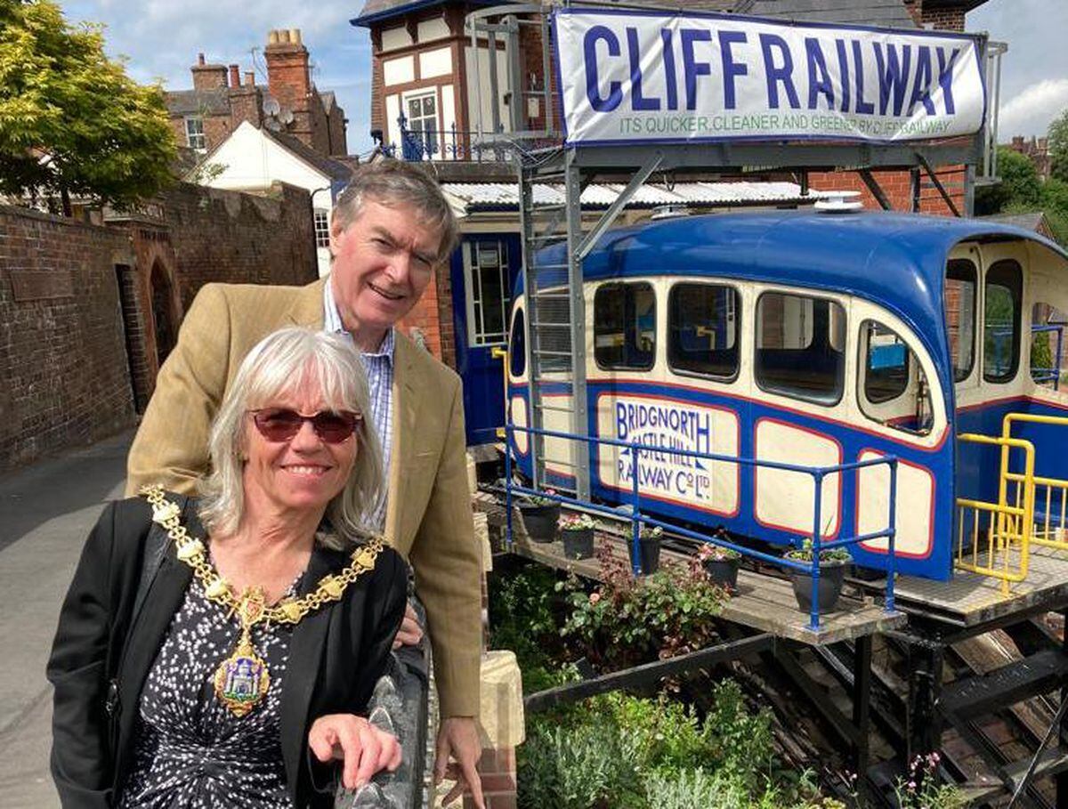 Philip Dunne MP congratulates new Mayor Karen Sawbridge at the Cliff Railway