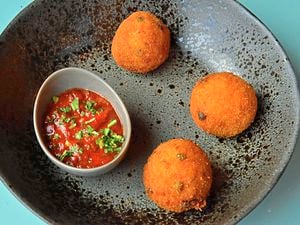 Three’s the magic number – the arancicni balls served with a red pepper tapenade dipPictures by John Sambrooks