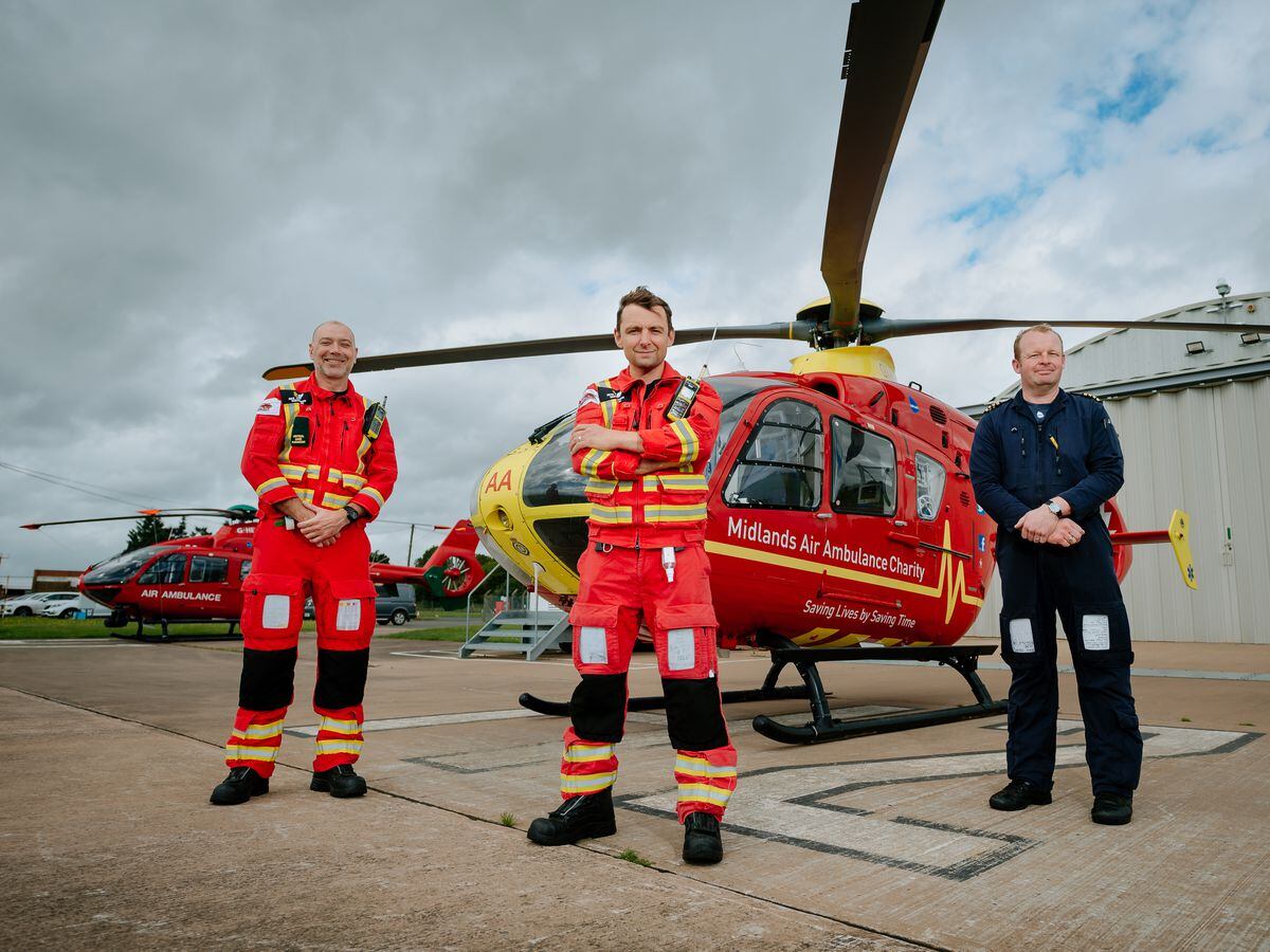 Ready for action at RAF Cosford – Air Ambulance paramedics Mike Andrews and Pete Edwards along with pilot Alastair Lees 