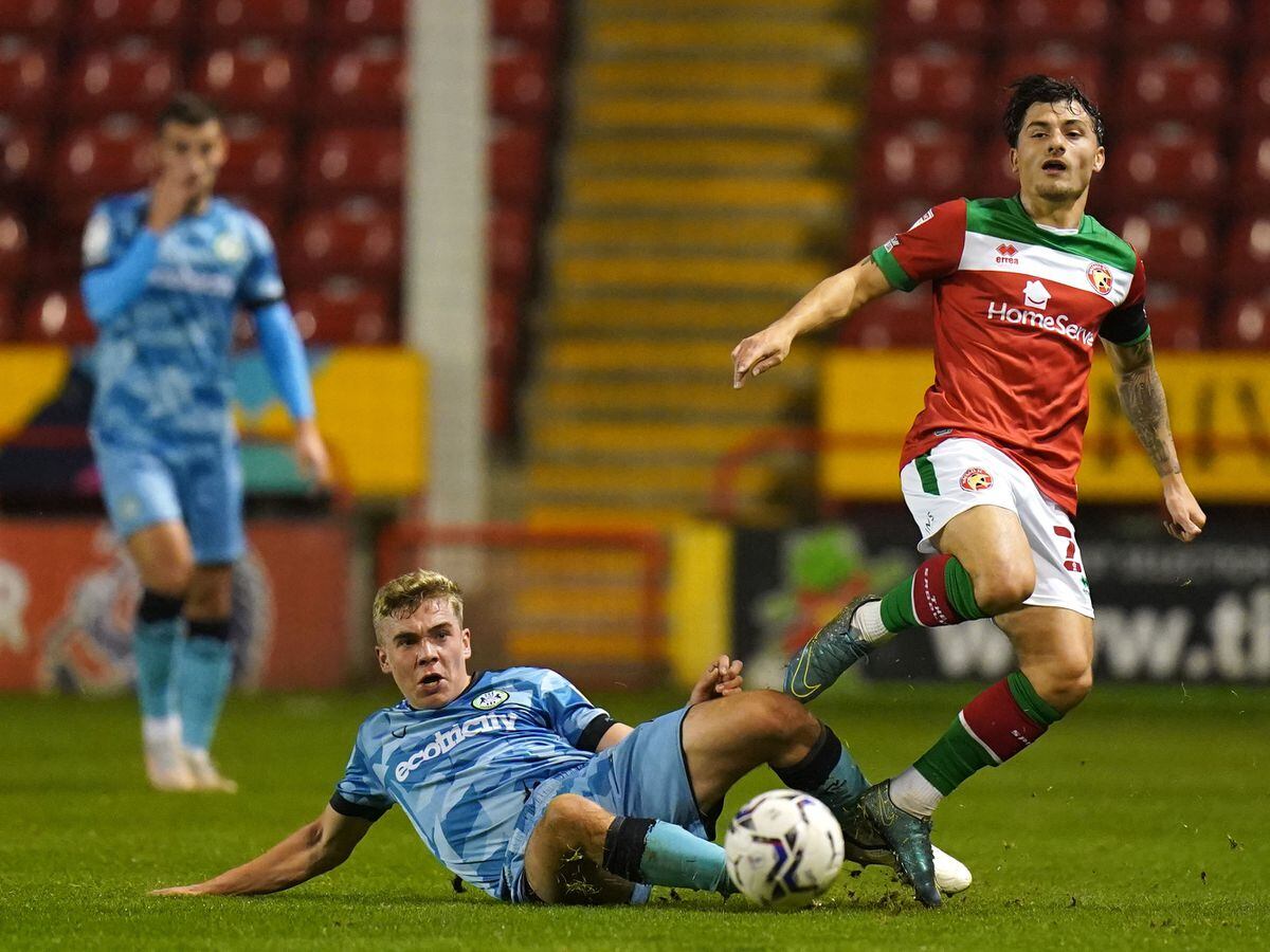 Forest Green Rovers' Jack Evans (left) and Walsall's Otis Khan battle for the ball during the Papa John's Trophy Southern Group D match at Banks's Stadium, Walsall. Picture date: Wednesday November 10, 2021. PA Photo. See PA Story SOCCER Walsall. Photo credit should read: Jacob King/PA Wire..RESTRICTIONS: EDITORIAL USE ONLY No use with unauthorised audio, video, data, fixture lists, club/league logos or "live" services. Online in-match use limited to 120 images, no video emulation. No use in betting, games or single club/league/player publications..