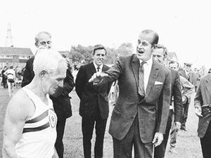 1971: On your marks... Philip starts off veteran Tipton athlete Jack Holden at the official opening of Tipton Sports Union's new stadium