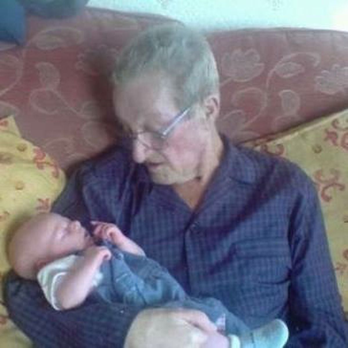 Bob, after his cancer diagnosis, with great grandson, Joseph, when he was a baby