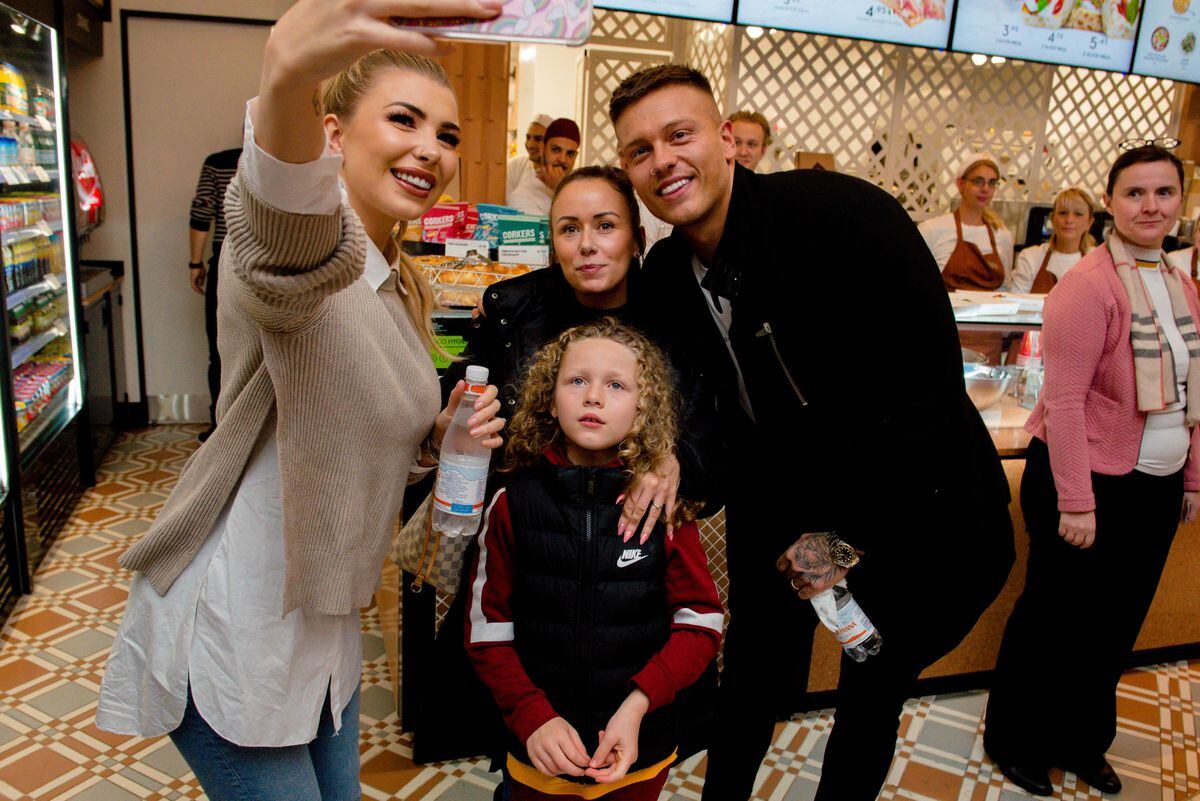 Love Island stars Olivia Buckland and Alex Bowen at Pizzasqr at Inu Merry Hill Shopping Centre in Brierley Hill. The newlyweds were runner-ups in the 2016 reality TV contest. In Picture: With fans.