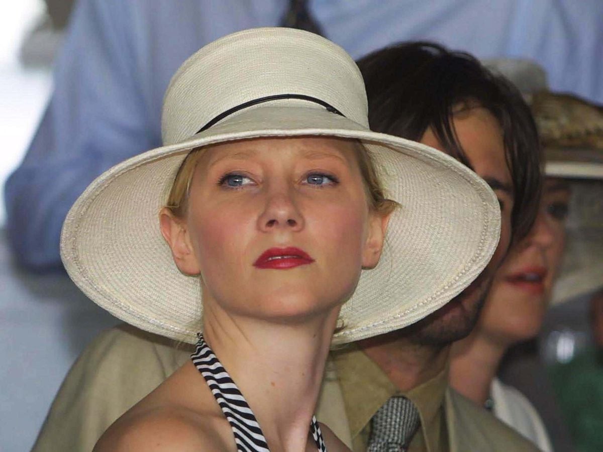 Anne Heche wears a wide-brimmed hat