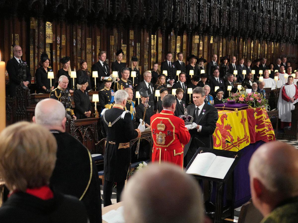 The Imperial State Crown is removed from the coffin by the Crown Jeweller at the Committal Service for Queen Elizabeth II, held at St George’s Chapel in Windsor Castle