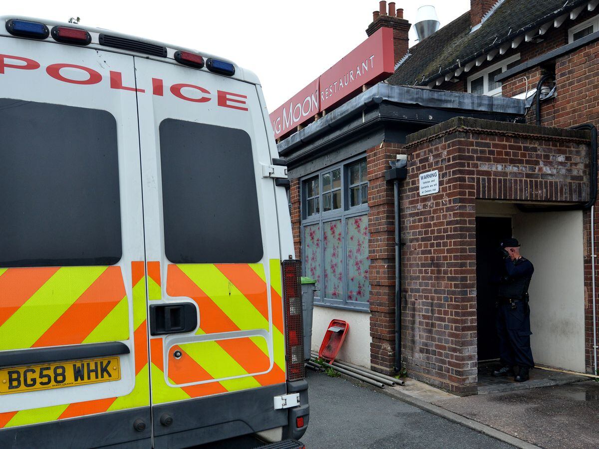 Police at Ming Moon restaurant on Stafford Road on Tuesday