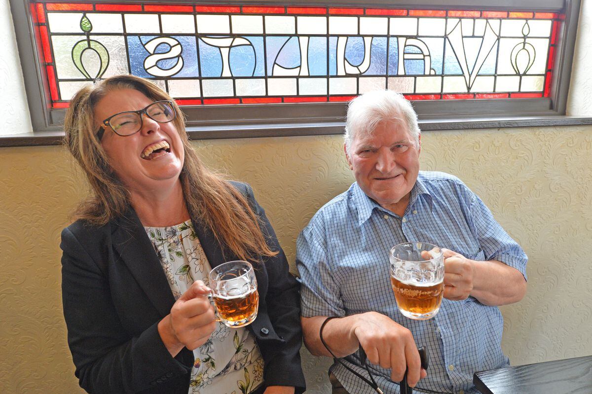 Lisa Newell and John Purchase share a joke seeing what the pub looks like