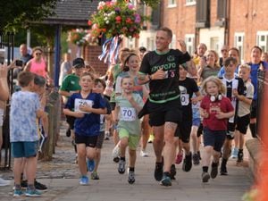 School children joined Andy for the last leg of the 70th triathlon. 