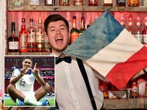 Events manager Danny McElwan, from The Parisian bar, Wolverhampton, gets set for the match on Saturday. Inset: Jude Bellingham.