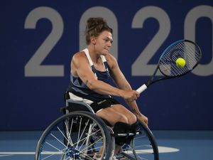 Britain's Jordanne Whiley competes against South Africa's Kgothatso Montjane and Mariska Venter during a women's doubles quarterfinal tennis match at the Tokyo 2020 Paralympic Games, Sunday, Aug. 29, 2021, in Tokyo, Japan. (AP Photo/Kiichiro Sato).
