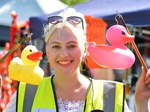 WALSALL PIC MNA PIC  DAVID HAMILTON PIC EXPRESS AND STAR 6/08/22 Hooking a duck during Bloxwich Bonanza, event secretary Lucy Shepherd, of Bloxwich, at The Green, Bloxwich..
