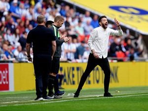 Carlos Corberan (right) gestures on the touchline during the Sky Bet Championship play-off final at Wembley Stadium, London. Picture date: Sunday May 29, 2022.