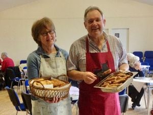 Pam Jarvie and Trefor Cook dishing up at a previous Big Breakfast