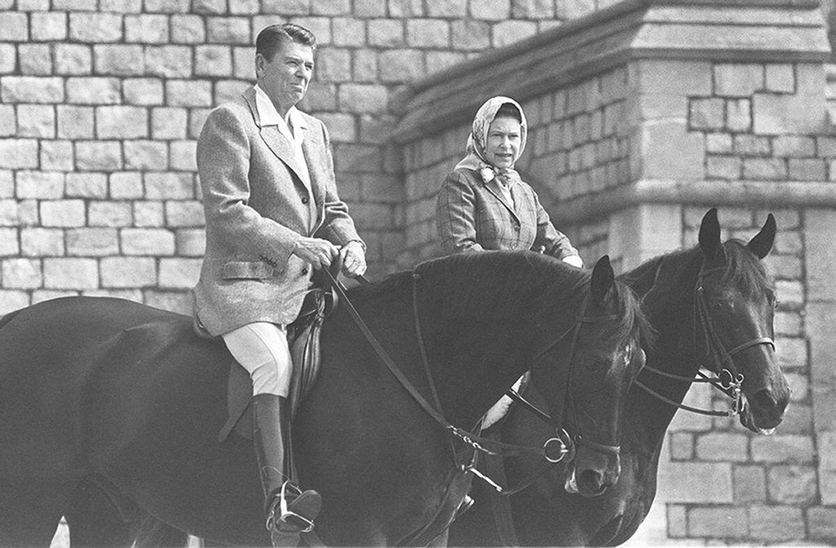 President Ronald Reagan goes riding in Windsor Home Park while staying as a guest of the Queen in 1982