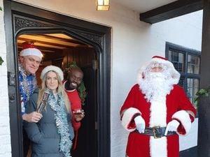 Jon Bentley, Georgie Barrat and Ortis Deley with Father Christmas
