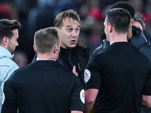 Julen Lopetegui speaking with referee Andrew Madley. Picture: Peter Byrne/PA Wire..