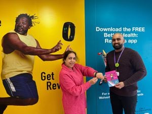 Councillor Jasbir Jaspal, Wolverhampton Council's cabinet member for public health and wellbeing, and public health engagement officer Amrik Sangha, are encouraging people to sign up to Better Health: Rewards