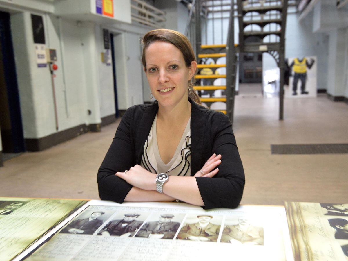 WMP Heritage Lead Corinne Brazier looks over Peaky Blinder archives in the Victorian lock-up
