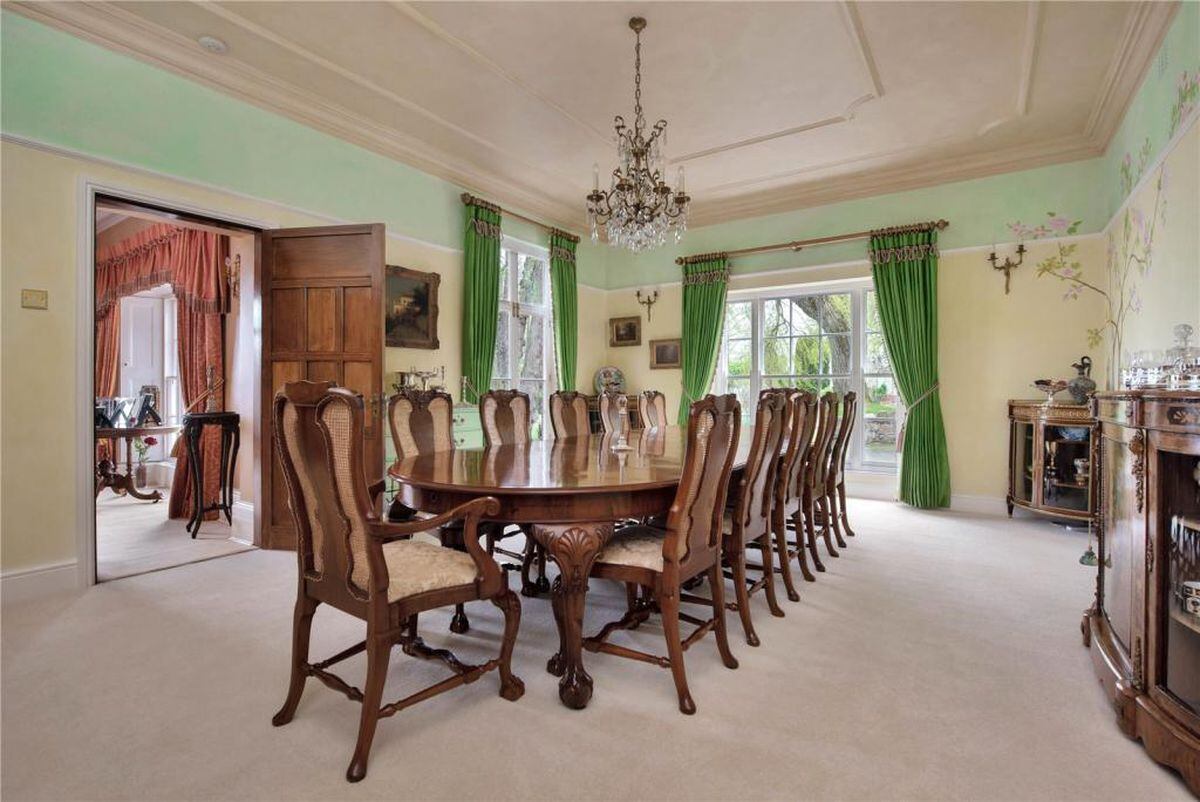 The dining room is set up to welcome multiple dinner guests. Photo: Rightmove/Fisher German, Worcester