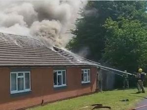 Firefighters tackle the blaze in Lawnswood Avenue. Photo: Staffordshire Fire & Rescue Service.
