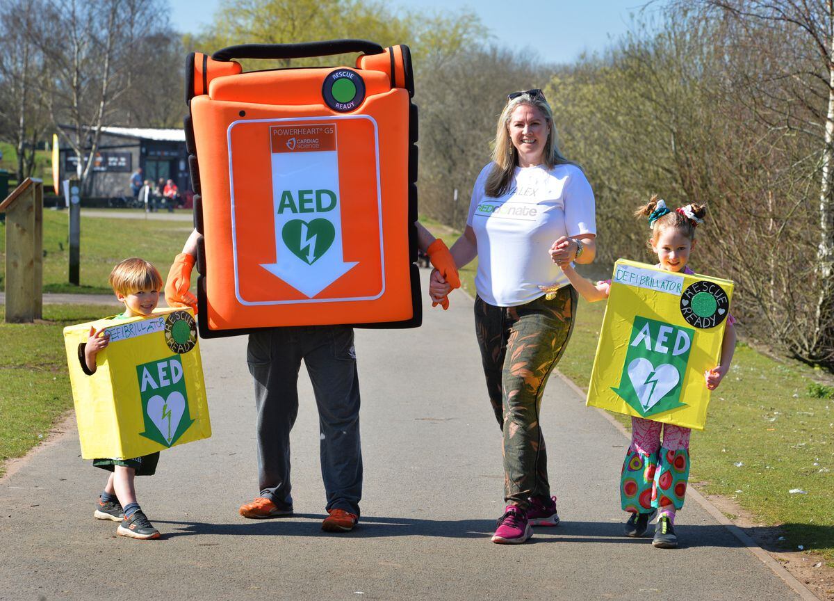 Taking part in a sponsored walk to raise money for a defibrillator, Rachel Dingle, of Burntwood, husband Martin Dingle, Bodhi Dingle, aged four, and Sarayah Dingle, aged six, at Chasewater.