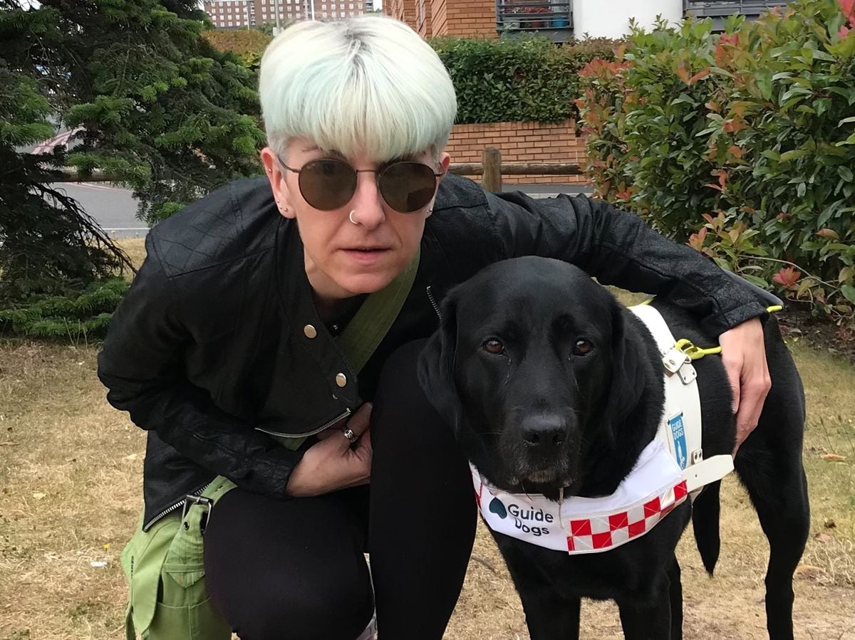 Nicola Owen with her guide dog, Kit