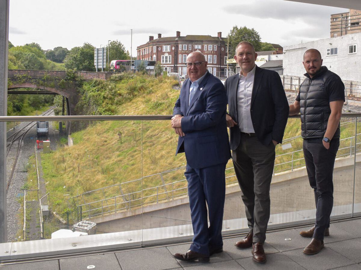 Mal Cowgill (principal and chief executive of Wolverhampton College), Neil Fulton (chief executive officer of the Black Country Innovative Manufacturing Organisation) and Davie Carns (managing director at National Infrastructure Solutions) pose near the new line