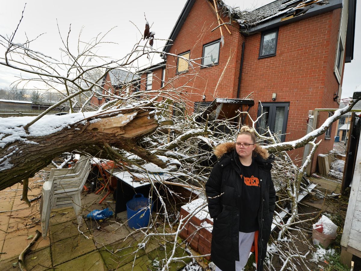Jessica Charlton outside the damaged house, in Blossom Gardens, in Silkmore, Stafford 