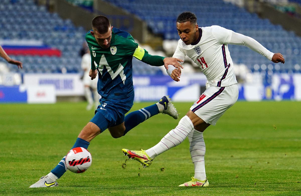 England's Cameron Archer (right) scores their side's first goal of the game during the UEFA European U21 Championship qualifying match at The John Smith's Stadium, Huddersfield. Picture date: Monday June 13, 2022. PA Photo. See PA story SOCCER England Under 21. Photo credit should read: Martin Rickett/PA Wire.            