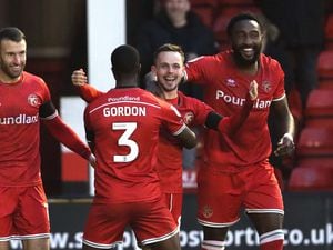 Walsall v Mansfield.Liam Kinsella (C) celebrates his goal with Liam Gordon (3) and Manny Monthe..