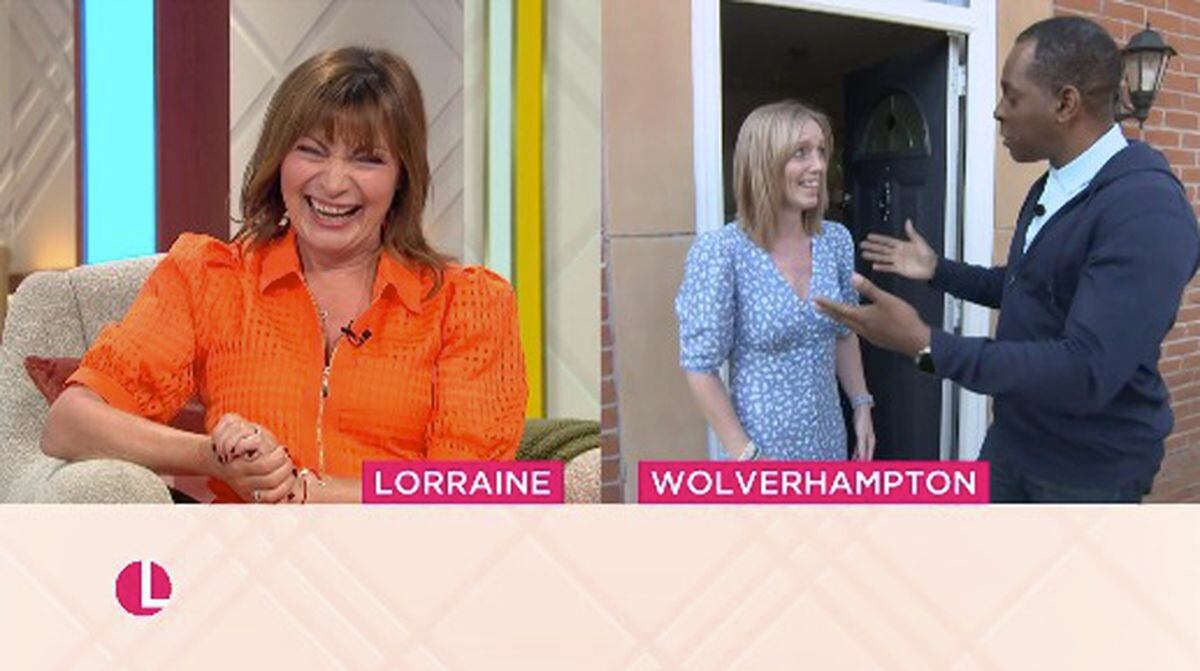 The moment Helen finds out she's won £10,000, with Lorraine Kelly smiling for her. Photo: ITV