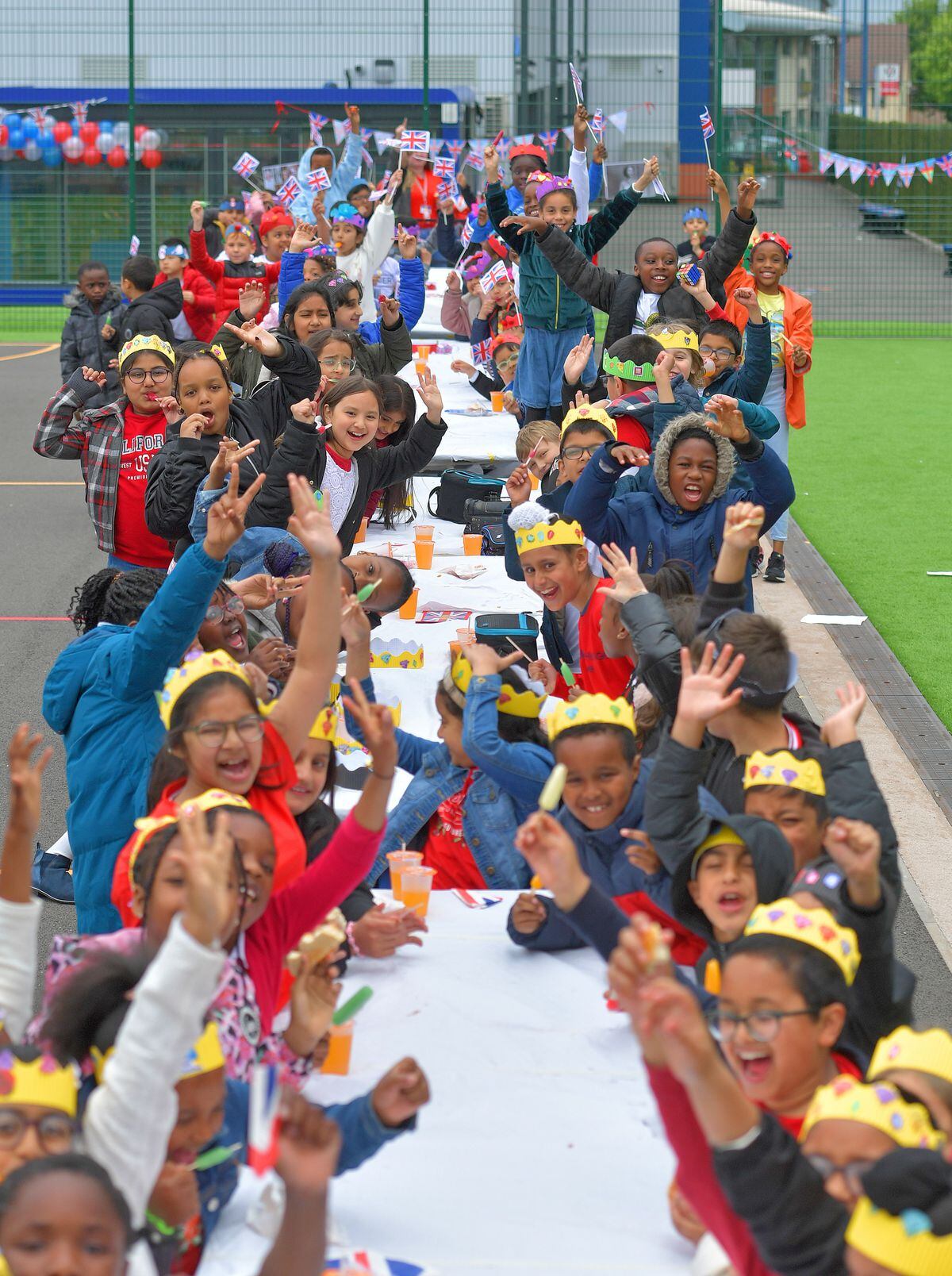 Children from St Matthew's School, Smethwick, enjoying their Jubilee party.